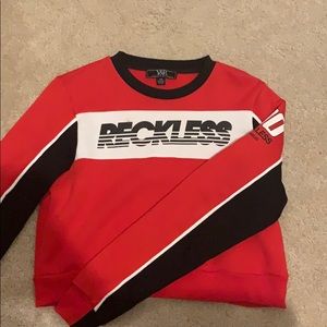 “Reckless” throw over sweatshirt